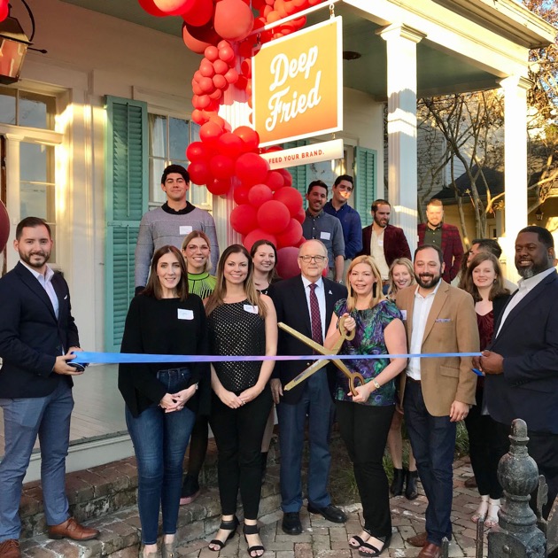 Ribbon cutting celebration at the Deep Fried 15 Year Party